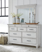 White dresser with mirror and drawer fronts, metal bar pulls