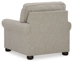Light gray upholstered armchair-style seat with rounded back and block feet.