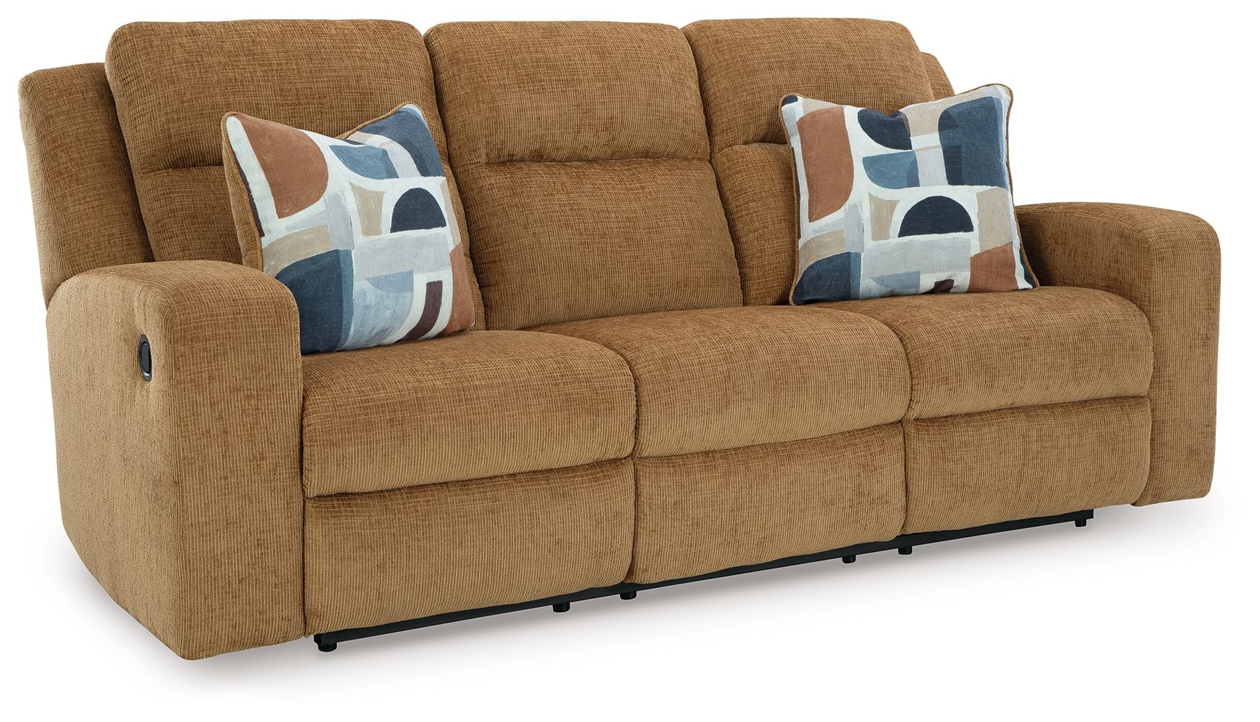 Light brown reclining sofa with two blue patterned throw pillows and padded arms