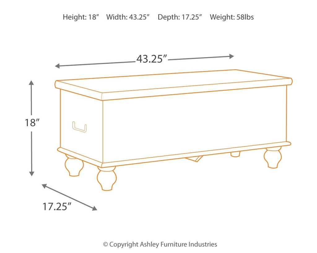 Beige storage bench with carved front panel and hinged top for storage