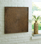 Antique brown square wall art panel with embossed concentric spiral ripple relief, framed
