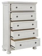 Antique white five-drawer chest with drawers pulled out and round knob pulls