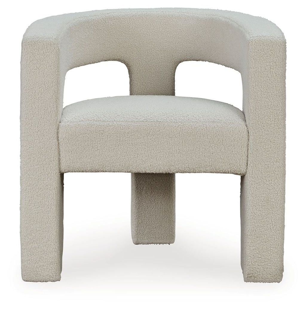 Light beige upholstered accent chair with thick arched back and cushioned seat