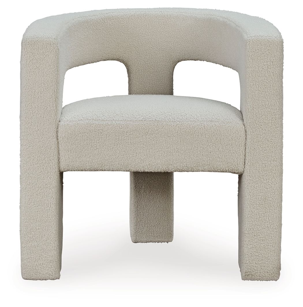Light beige upholstered accent chair with thick arched back and cushioned seat