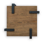 Rectangular table top from above with wood grain and black metal hand grips on corners