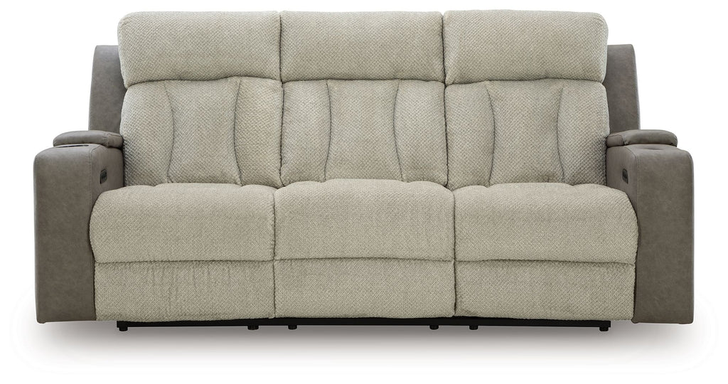 Power reclining sofa front view in light tan fabric with channel tufted back