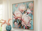 Framed floral wall art with white and pink blossoms on aqua teal, wall mounted