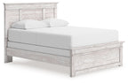 White panel bed with padded top rail and rectangular headboard panels