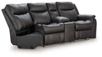 Reclining loveseat with split back cushions, dark gray faux leather, pull-out footrests