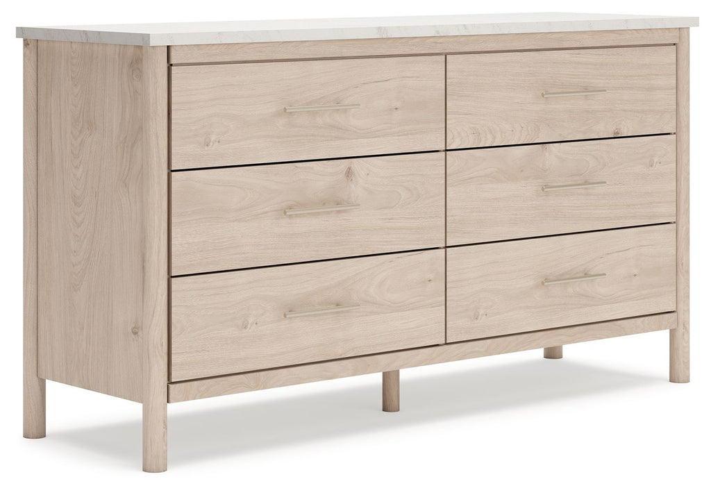 Beige six-drawer dresser with straight legs and metal bar pulls, light wood finish