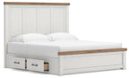 White panel storage bed with two front drawer compartments, paneled headboard