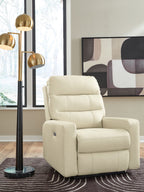 Power recliner with adjustable headrest in cream upholstery, wide arms and cushioned seat