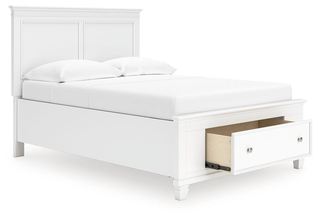 White panel bed with open underbed storage drawer and two pillows on mattress