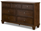 Brown dresser with six front drawers and round knobs, squared bun feet
