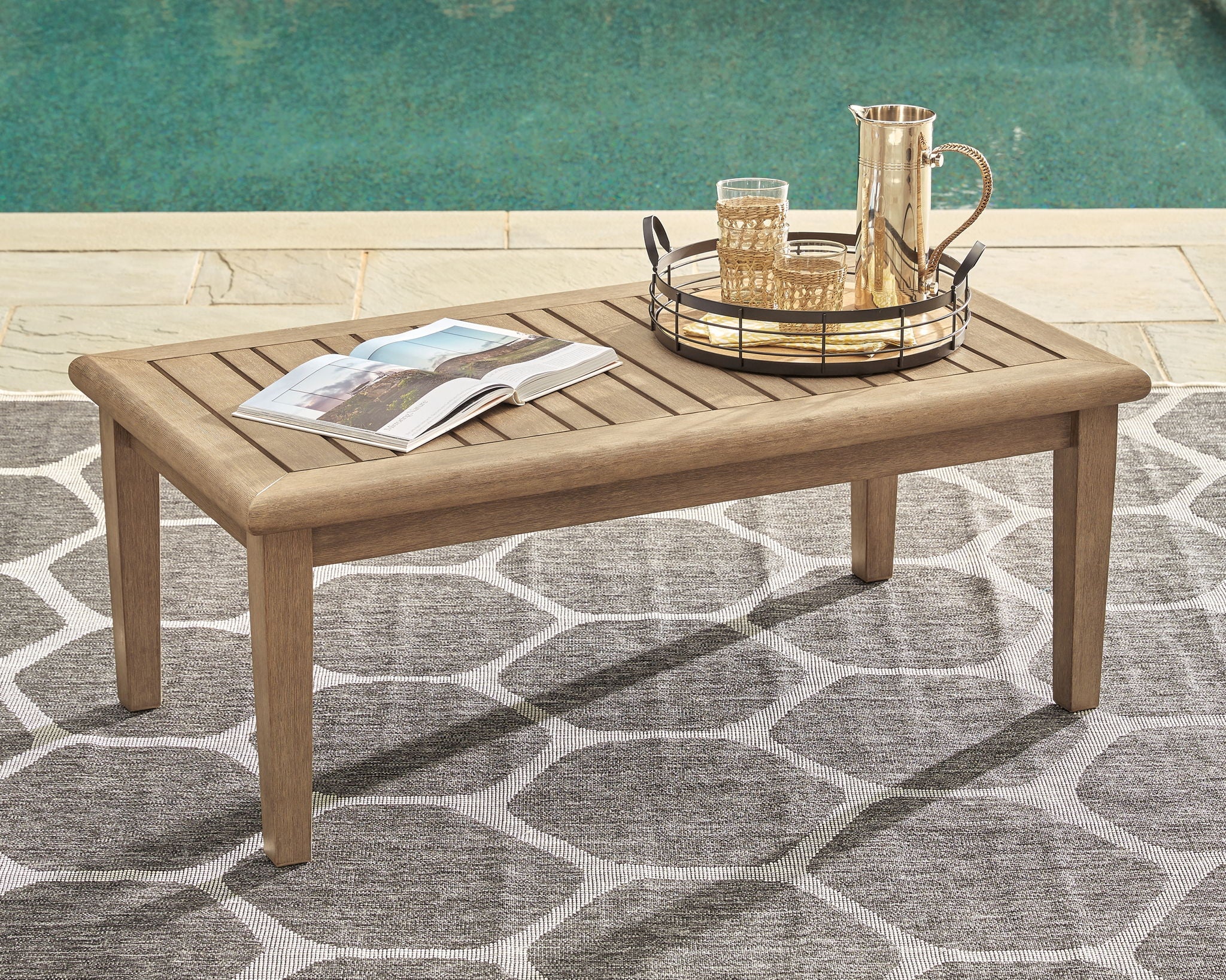 Brown rectangular cocktail table with slatted top and tapered legs