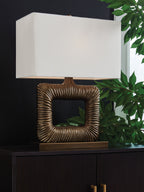 Antique brass metal table lamp base with square cutout and white rectangular shade