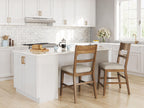 Set of two light brown barstools with upholstered oatmeal seats and backs