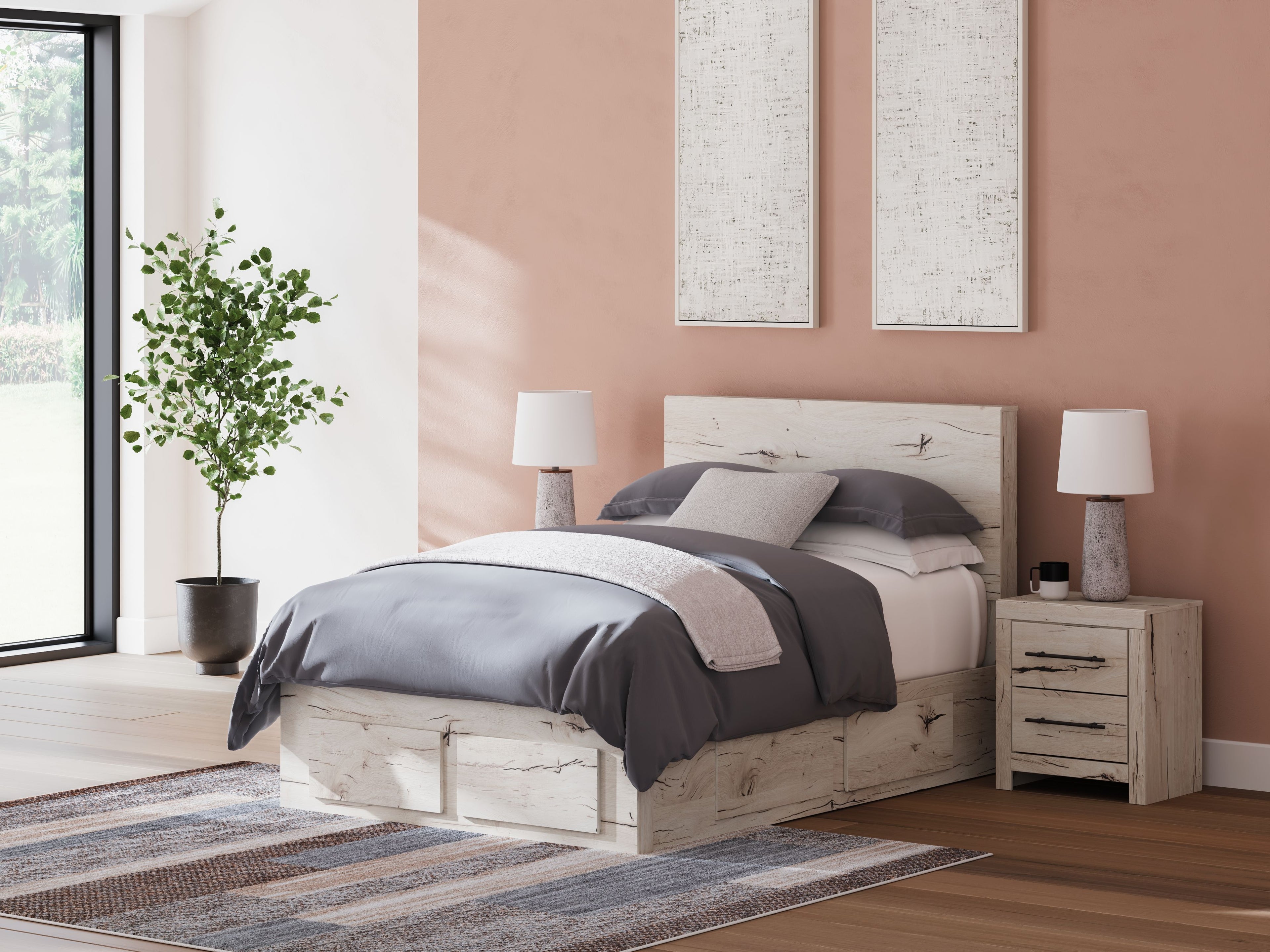 Light wood panel bed with storage drawers, gray duvet and layered pillows