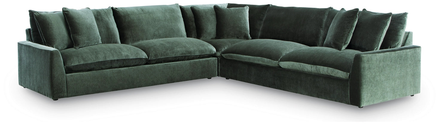 Jade green L-shaped sectional sofa with chaise and five back pillows