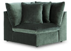 Jade green corner sectional chair with padded back cushions