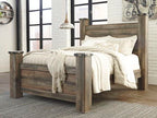Brown queen poster bed rails with carved finials