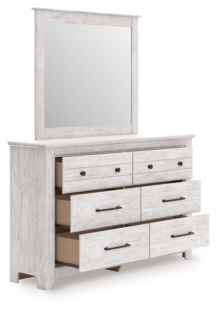 Whitewash six-drawer dresser with open shelving and a tall mirror
