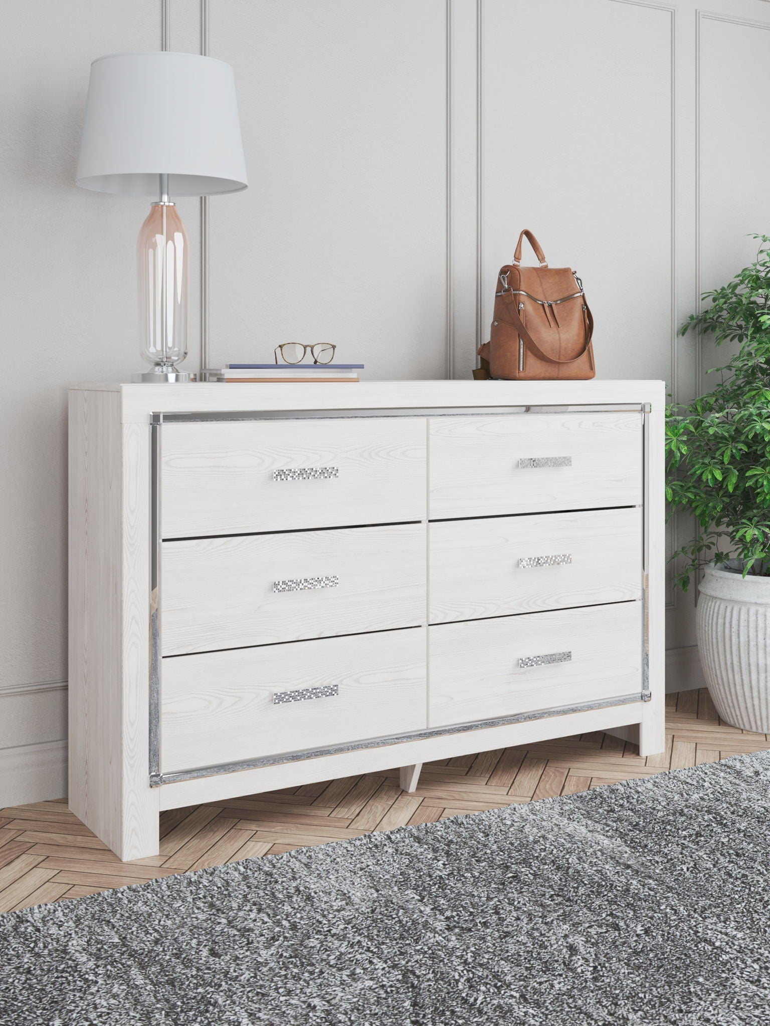 White bedroom dresser with six drawers and metal bar pulls