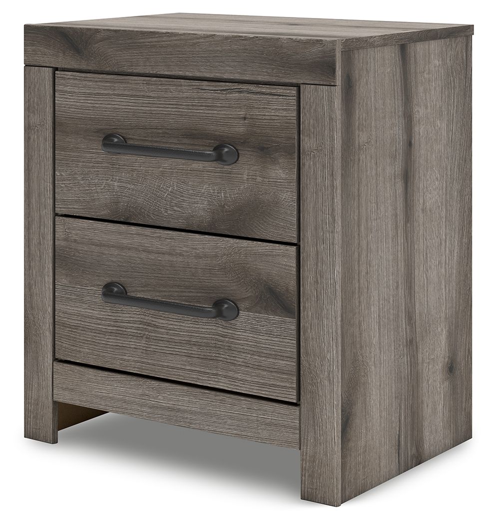 Gray two-drawer night stand with metal bar handles, side view