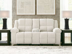Reclining loveseat with console, light beige tufted upholstery, wide back and arm caps