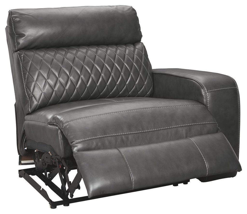 Gray power recliner chair with diamond-quilted back and exposed lift mechanism
