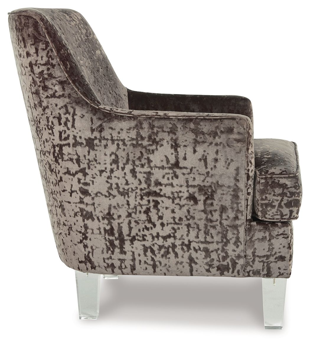 Charcoal accent chair side view, distressed upholstery, barrel arms, clear legs