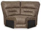 Wedge sofa with dark fossil fabric, padded backrest and armrests