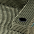 Green corduroy chaise with built-in cup holder opening in the armrest