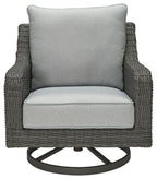 Gray swivel lounge chair with light gray cushion and woven dark-gray wicker base