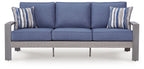 Blue outdoor sofa with gray frame, three seat sections and two striped throw pillows