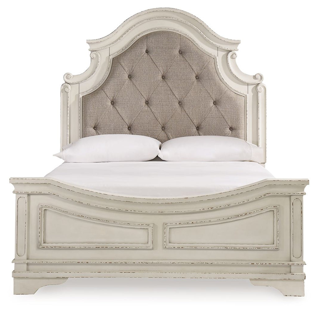 Upholstered panel bed with tufted beige headboard and white footboard, two pillows