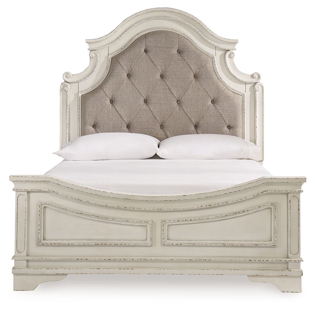 Upholstered panel bed with tufted beige headboard and white footboard, two pillows