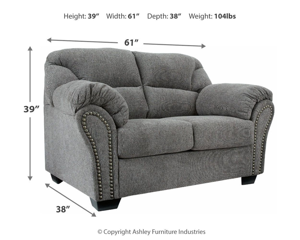 Pewter gray loveseat with nailhead trim, rounded arms, and tufted back cushions
