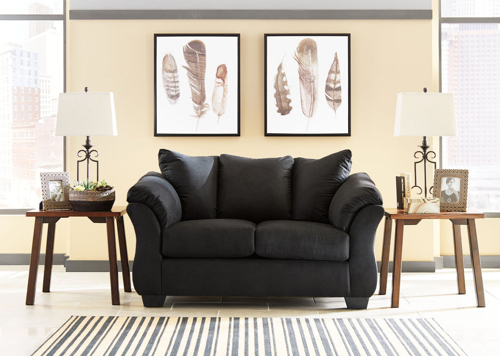 Darcy stationary loveseat in black fabric with rolled arms and two seat cushions