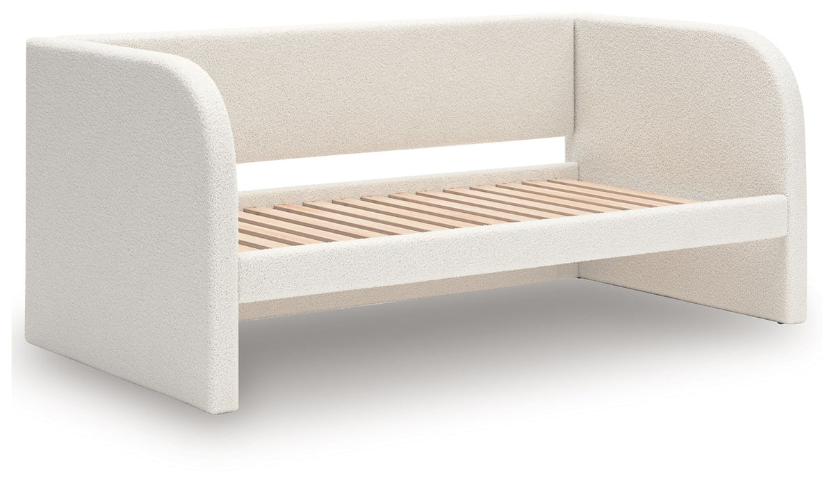 White upholstered day bed with visible slatted base and open underside