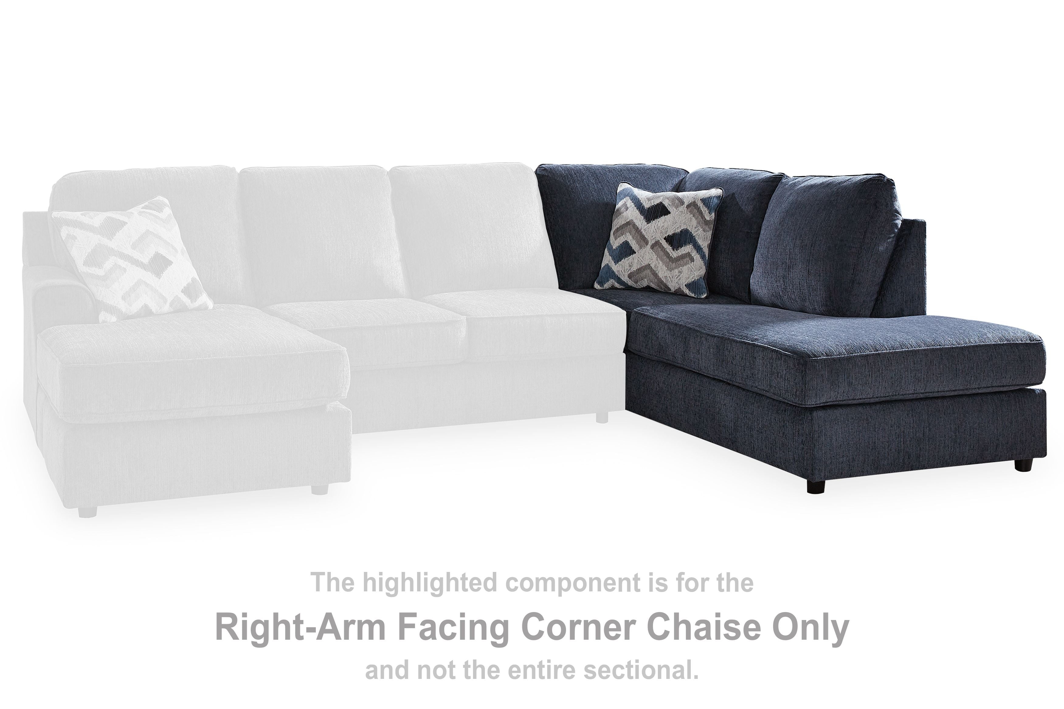 Cobalt corner chaise with chaise seat and back cushions, shown with dark throw pillows