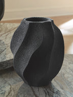 Black textured vase with fluted curves and narrow round mouth