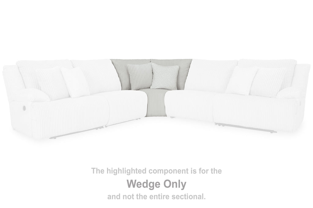 White sectional corner with wedge section highlighted in fabric