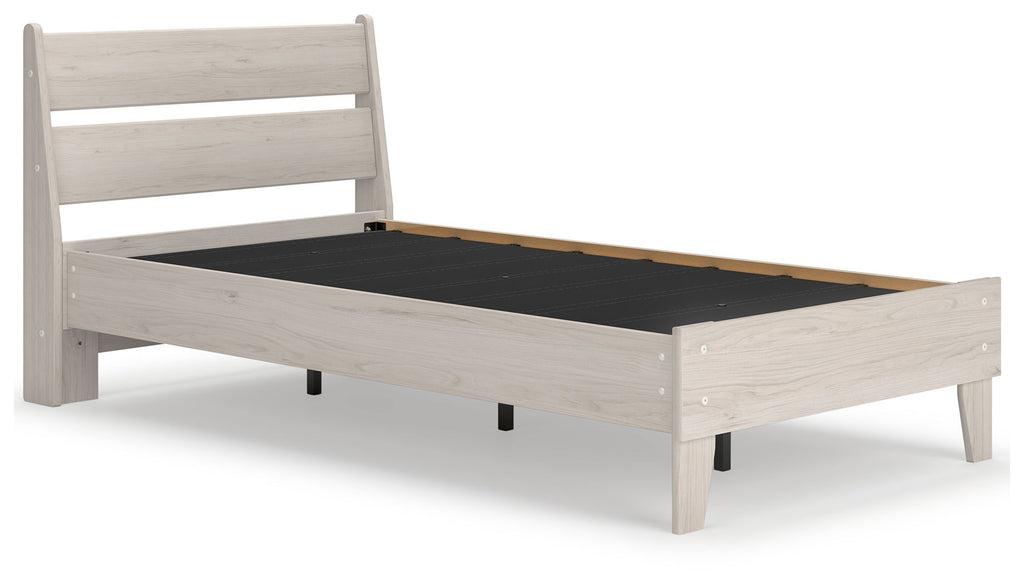 Beige panel platform bed frame with dark interior platform base