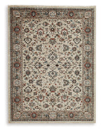Beritham rug with ornate border and medallion floral pattern, beige base and multicolor accents