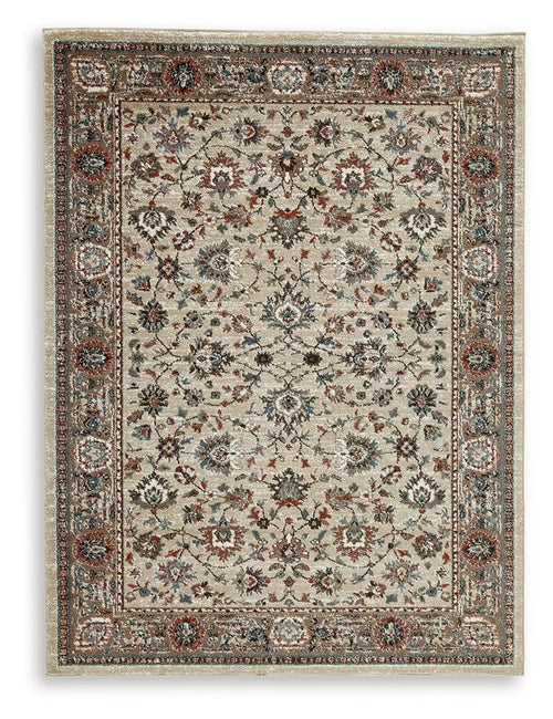 Beritham rug with ornate border and medallion floral pattern, beige base and multicolor accents