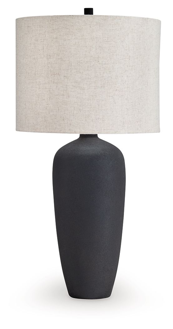 Black metal table lamp with beige fabric drum shade and dark base