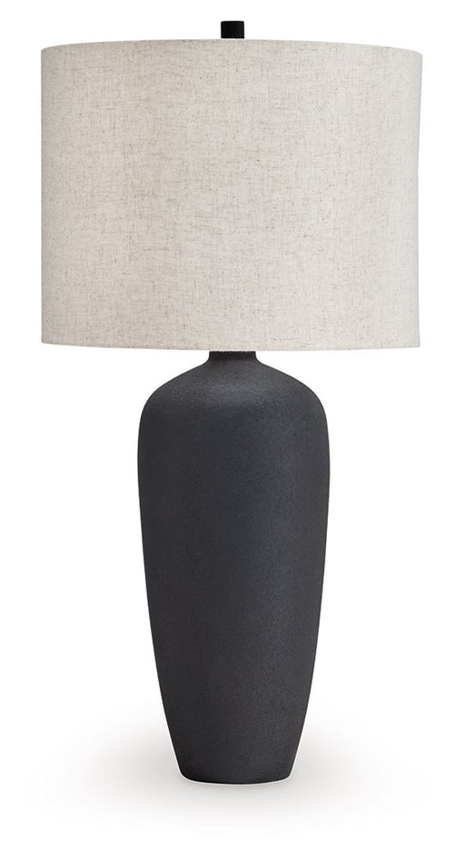 Black metal table lamp with beige fabric drum shade and dark base