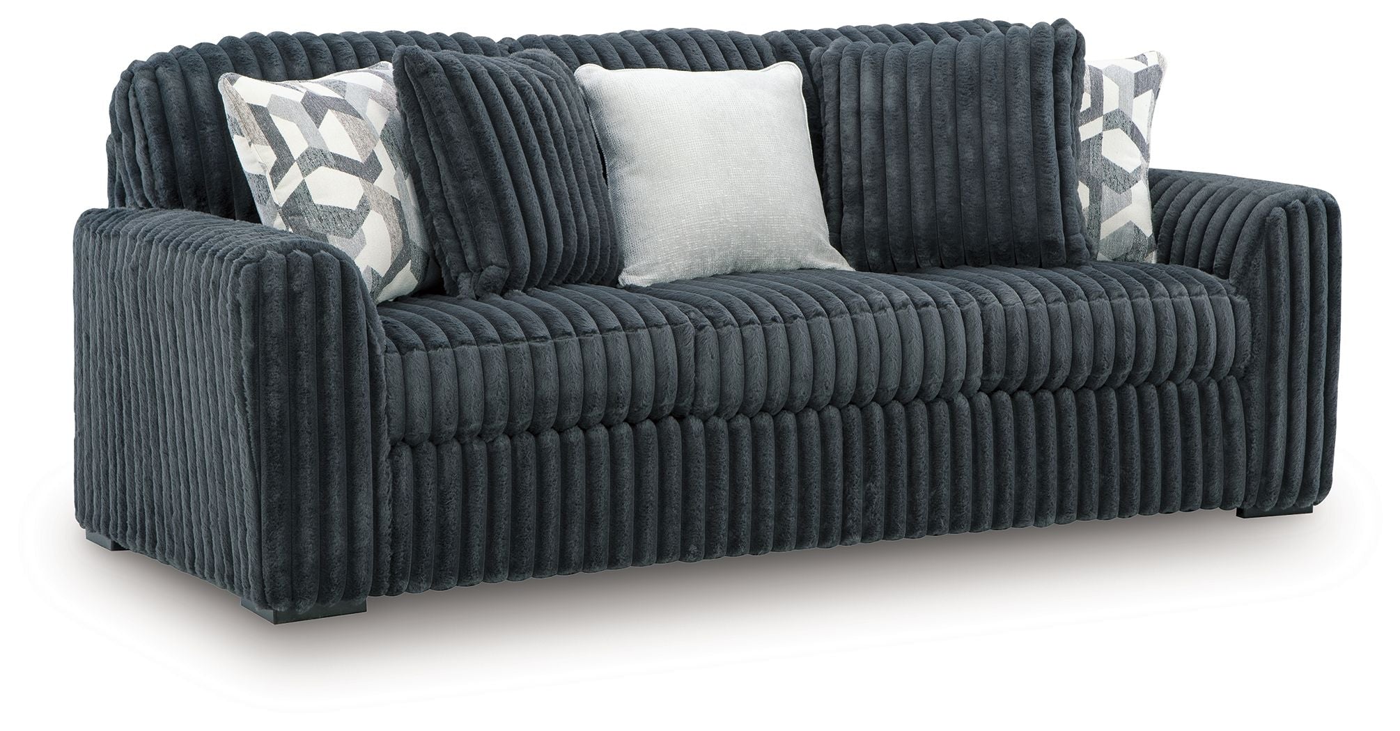 Dark gray corduroy sofa with two side arms and three back cushions; includes patterned pillows.