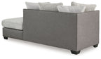 Corner chaise lounge with light gray ribbed seat, two pillows, gray side panels